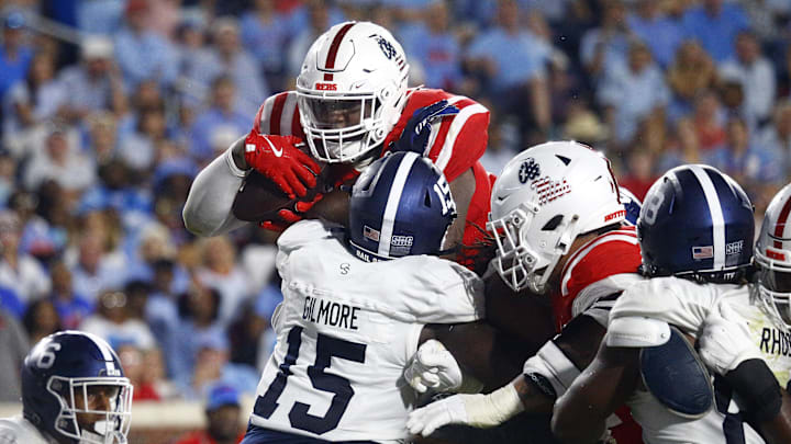 Sep 21, 2024; Oxford, Mississippi, USA; Mississippi Rebels defensive linemen JJ Pegues (38) leaps over a pile for a touchdown during the second half against the Georgia Southern Eagles at Vaught-Hemingway Stadium. Mandatory Credit: Petre Thomas-Imagn Images