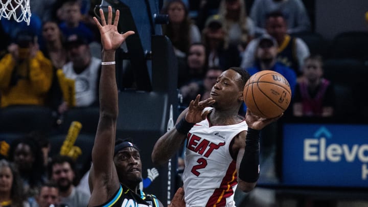 Apr 7, 2024; Indianapolis, Indiana, USA; Miami Heat guard Terry Rozier (2) passes the ball while Indiana Pacers forward Pascal Siakam (43) defends in the first half at Gainbridge Fieldhouse. Mandatory Credit: Trevor Ruszkowski-USA TODAY Sports