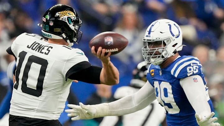 Indianapolis Colts defensive tackle DeForest Buckner (99) puts pressure on Jacksonville Jaguars quarterback Mac Jones (10) on Sunday, Jan. 5, 2025, during a game against the Jacksonville Jaguars at Lucas Oil Stadium in Indianapolis.