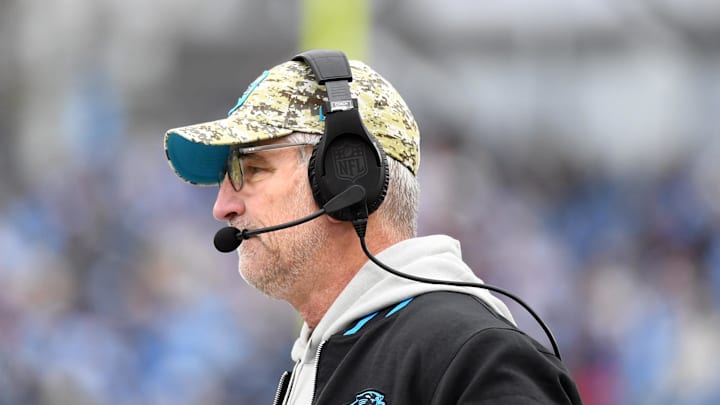 Frank Reich watches a Panthers game against the Titans from the sidelines.