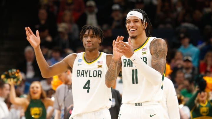 Mar 22, 2024; Memphis, TN, USA; Baylor Bears forward Jalen Bridges (11) and guard Ja'Kobe Walter (4) react during the second half against the Colgate Raiders in the NCAA Tournament First Round at FedExForum. Mandatory Credit: Petre Thomas-USA TODAY Sports