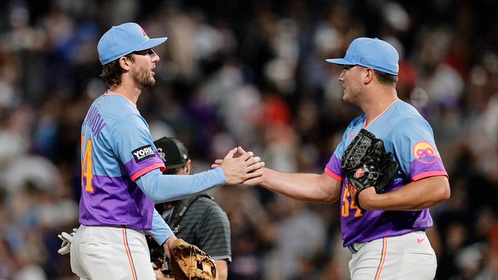 Colorado Rockies relief third baseman Ryan McMahon (24) celebrates with pitcher Seth Halvorsen (54) after the game against the Minnesota Twins at Coors Field on July 18, 2025. Colorado Rockies relief third baseman Ryan McMahon (24) celebrates with pitcher Seth Halvorsen (54) after the game against the Minnesota Twins at Coors Field on July 18, 2025.