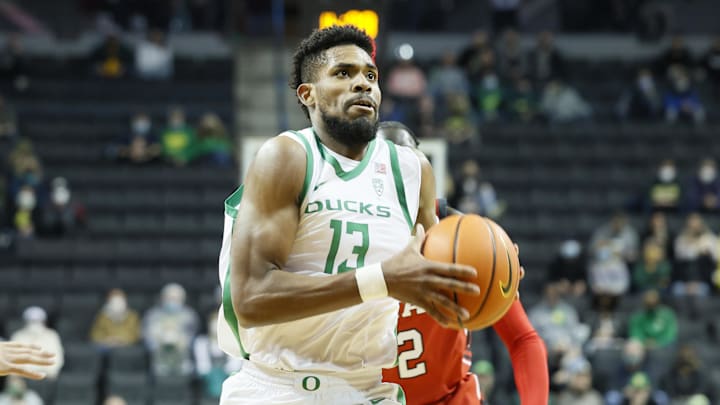 Jan 1, 2022; Eugene, Oregon, USA; Oregon Ducks forward Quincy Guerrier (13) drives to the basket