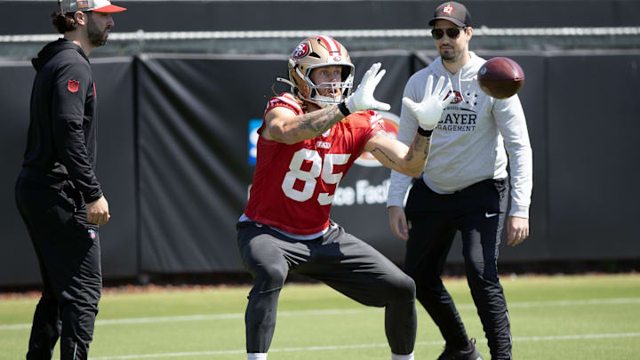 Jun 10, 2025; Santa Clara, CA, USA; San Francisco 49ers tight end George Kittle (85) works out with his teammates during an OTA at Levi's Stadium. Mandatory Credit: D. Ross Cameron-Imagn Images
