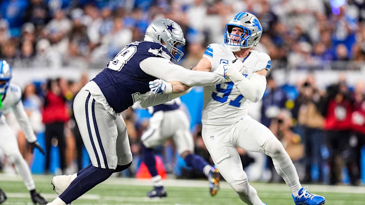Detroit Lions defensive end Aidan Hutchinson (97) pressures Dallas Cowboys offensive tackle Terence Steele (78) during the first half at Ford Field in Detroit on Thursday, Dec. 4, 2025. Detroit Lions defensive end Aidan Hutchinson (97) pressures Dallas Cowboys offensive tackle Terence Steele (78) during the first half at Ford Field in Detroit on Thursday, Dec. 4, 2025.