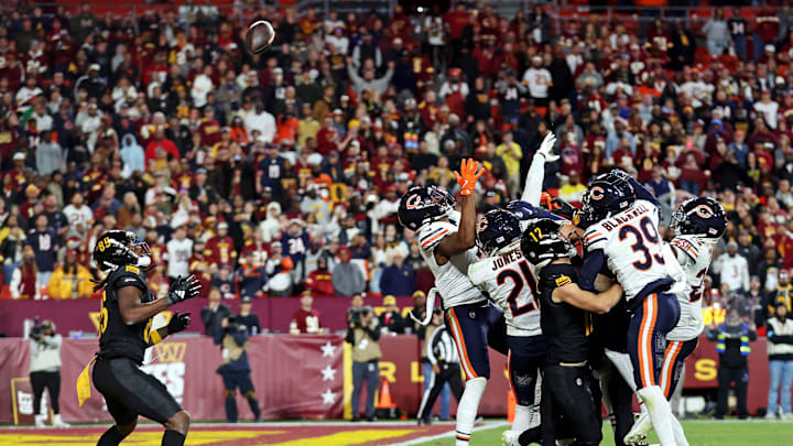 Oct 27, 2024; Landover, Maryland, USA; Washington Commanders wide receiver Noah Brown (85) catches a Hail Mary pass that was tipped with no time left to beat the Chicago Bears at Commanders Field. Mandatory Credit: Peter Casey-Imagn Images