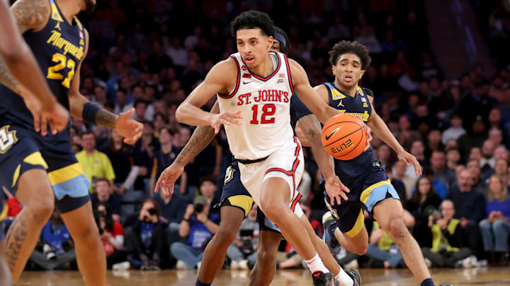 Mar 14, 2025; New York, NY, USA; St. John's basketball guard RJ Luis Jr. (12) brings the ball up court against the Marquette Golden Eagles during the second half at Madison Square Garden. 
