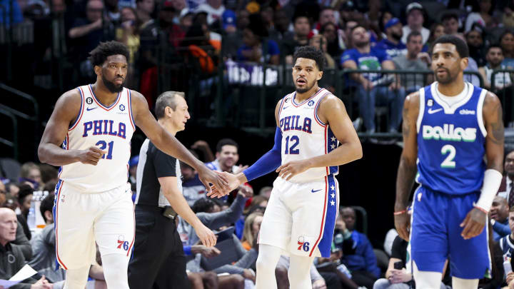Mar 2, 2023; Dallas, Texas, USA; Philadelphia 76ers center Joel Embiid (21) celebrates with Philadelphia 76ers forward Tobias Harris (12) during the second quarter against the Dallas Mavericks at American Airlines Center. Mandatory Credit: Kevin Jairaj-USA TODAY Sports Mar 2, 2023; Dallas, Texas, USA; Philadelphia 76ers center Joel Embiid (21) celebrates with Philadelphia 76ers forward Tobias Harris (12) during the second quarter against the Dallas Mavericks at American Airlines Center. Mandatory Credit: Kevin Jairaj-USA TODAY Sports