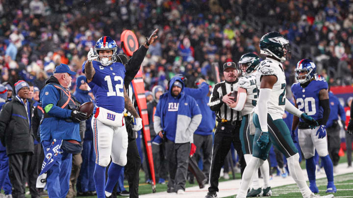 Jan 7, 2024; East Rutherford, New Jersey, USA; New York Giants tight end Darren Waller (12) reacts after a first down during the first half against the Philadelphia Eagles at MetLife Stadium. Mandatory Credit: Vincent Carchietta-USA TODAY Sports