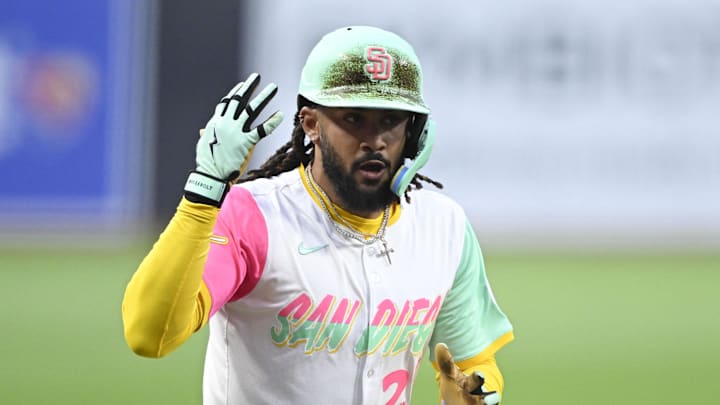 Mar 28, 2025; San Diego, California, USA; San Diego Padres right fielder Fernando Tatis Jr. (23) rounds the bases after hitting a solo home run during first inning against the Atlanta Braves at Petco Park. Mandatory Credit: Denis Poroy-Imagn Images
