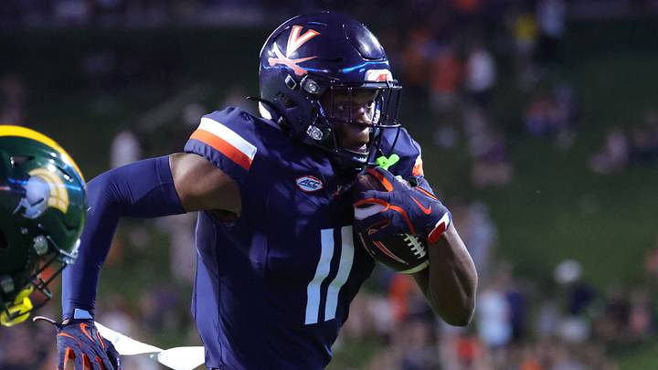 Sep 11, 2026; Charlottesville, Virginia, USA; Virginia Cavaliers wide receiver Isaiah Robinson (11) runs after making a catch during the fourth quarter against the Norfolk State Spartans at Scott Stadium. Mandatory Credit: Amber Searls-Imagn Images Sep 11, 2026; Charlottesville, Virginia, USA; Virginia Cavaliers wide receiver Isaiah Robinson (11) runs after making a catch during the fourth quarter against the Norfolk State Spartans at Scott Stadium. Mandatory Credit: Amber Searls-Imagn Images