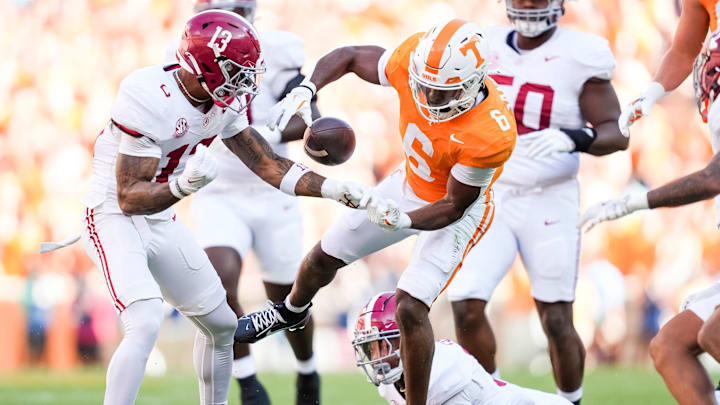 Tennessee running back Dylan Sampson (6) and Alabama defensive back Malachi Moore (13) try to recover a loose ball during an SEC conference game between Tennessee and Alabama in Neyland Stadium on Saturday, Oct. 19, 2024. Tennessee running back Dylan Sampson (6) and Alabama defensive back Malachi Moore (13) try to recover a loose ball during an SEC conference game between Tennessee and Alabama in Neyland Stadium on Saturday, Oct. 19, 2024.