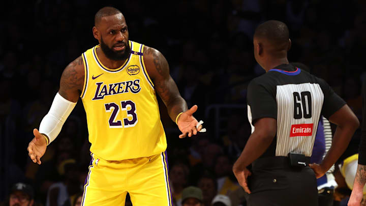 Oct 22, 2024; Los Angeles, California, USA; Los Angeles Lakers forward LeBron James (23) argues with NBA referee James Williams (60) during the first quarter against the Minnesota Timberwolves at Crypto.com Arena. Mandatory Credit: Jason Parkhurst-Imagn Images