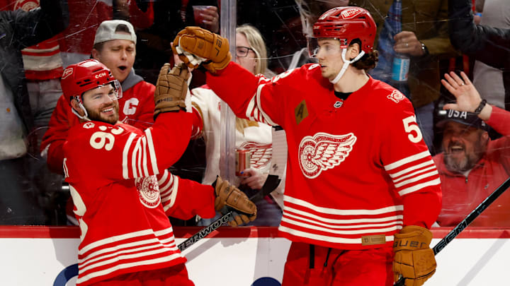 Mar 6, 2026; Detroit, Michigan, USA;  Detroit Red Wings right wing Alex DeBrincat (93) receives congratulations from defenseman Moritz Seider (53) after scoring in the second period against the Florida Panthers at Little Caesars Arena. Mandatory Credit: Rick Osentoski-Imagn Images