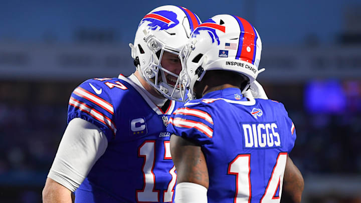Jan 9, 2022; Orchard Park, New York, USA; Buffalo Bills wide receiver Stefon Diggs (14) celebrates a catch that was ruled incomplete with teammate quarterback Josh Allen (17) against the New York Jets during the first half at Highmark Stadium. Jan 9, 2022; Orchard Park, New York, USA; Buffalo Bills wide receiver Stefon Diggs (14) celebrates a catch that was ruled incomplete with teammate quarterback Josh Allen (17) against the New York Jets during the first half at Highmark Stadium.