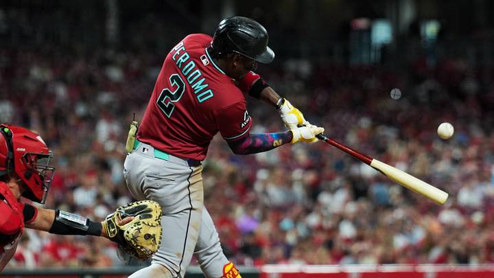 Jun 12, 2026; Cincinnati, Ohio, USA; Arizona Diamondbacks shortstop Geraldo Perdomo (2) hits and reaches first base on a fielding error by Cincinnati Reds outfielder Blake Dunn in the ninth inning at Great American Ball Park. Arizona Diamondbacks’ Gabriel Moreno would score on the error. Mandatory Credit: Aaron Doster-Imagn Images Jun 12, 2026; Cincinnati, Ohio, USA; Arizona Diamondbacks shortstop Geraldo Perdomo (2) hits and reaches first base on a fielding error by Cincinnati Reds outfielder Blake Dunn in the ninth inning at Great American Ball Park. Arizona Diamondbacks’ Gabriel Moreno would score on the error. Mandatory Credit: Aaron Doster-Imagn Images