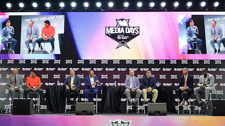 Jul 9, 2025; Frisco, TX, USA; Head coaches Willie Fritz of Houston, Mike Gundy of Oklahoma State, Rich Rodriguez of West Virginia, Lance Leipold of Kansas, Sonny Dykes of TCU, Kyle Whittingham of Utah, Brent Brennan of Arizona and Deion Sanders of Colorado all sit on stage for a Coaches Roundtable during 2025 Big 12 Football Media Days at The Star. Mandatory Credit: Raymond Carlin III-Imagn Images