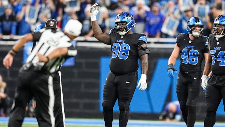 Detroit Lions defensive tackle DJ Reader asks for crowd noise before a play against the Buffalo Bills during the first half at Ford Field in Detroit on Sunday, Dec. 15, 2024.