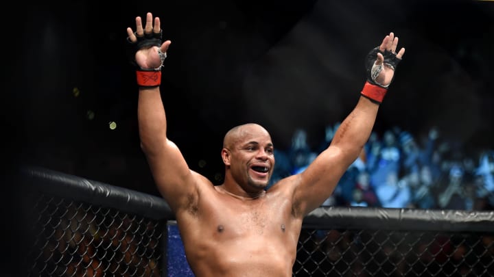 Jan 20, 2018; Boston, MA, USA; Daniel Cormier (red gloves) celebrates his victory against Volkan Oezdemir (not seen) during UFC 220 at the TD Garden. Mandatory Credit: Bob DeChiara-USA TODAY Sports
