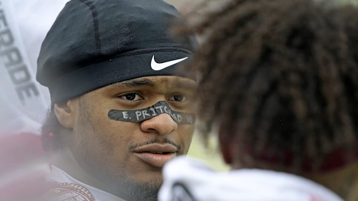 Sep 6, 2025; Tallahassee, Florida, USA; Florida State Seminoles safety Earl Little Jr. (0) talks with quarterback Tommy Castellanos (1) on the sidelines during the second half against the East Texas A&M Lions at Doak S. Campbell Stadium. Mandatory Credit: Melina Myers-Imagn Images