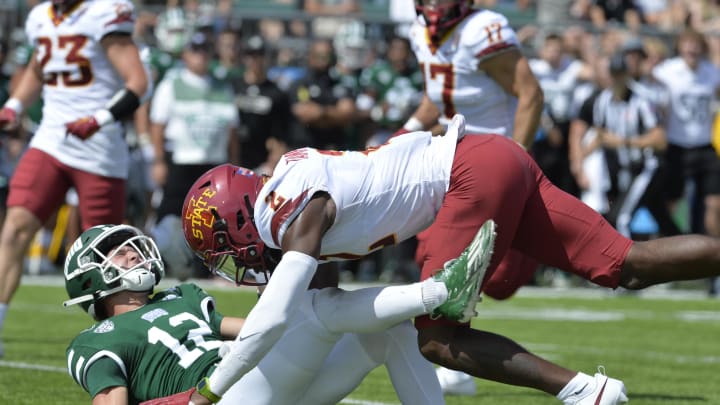 Sep 16, 2023; Athens, Ohio, USA; Ohio Bobcats wide receiver Sam Wiglusz (12) takes a hit from Iowa Sep 16, 2023; Athens, Ohio, USA; Ohio Bobcats wide receiver Sam Wiglusz (12) takes a hit from Iowa