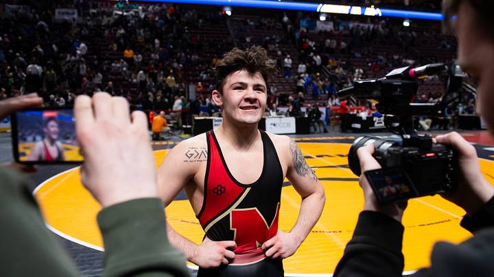 Bishop McCort's Bo Bassett talks to members of the media after winning the Class 2A 145-pound championship bout by fall during the PIAA Individual Wrestling Championships, March 7, 2026, in Hershey, Pa.