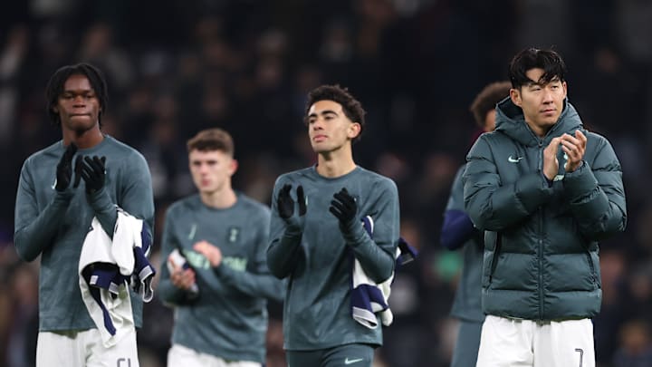 Spurs players acknowledge the fans after the game