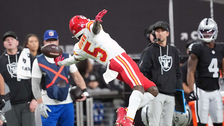 Jan 4, 2026; Paradise, Nevada, USA; Kansas City Chiefs wide receiver Hollywood Brown (5) attempts to catch the ball against the Las Vegas Raiders in the second half at Allegiant Stadium. Mandatory Credit: Kirby Lee-Imagn Images