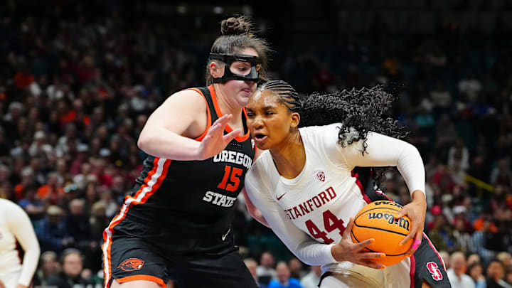 Mar 8, 2024; Las Vegas, NV, USA; Stanford Cardinal forward Kiki Iriafen (44) drives the lane against Oregon State Beavers forward Raegan Beers (15) during the fourth quarter at MGM Grand Garden Arena. Mandatory Credit: Stephen R. Sylvanie-Imagn Images Mar 8, 2024; Las Vegas, NV, USA; Stanford Cardinal forward Kiki Iriafen (44) drives the lane against Oregon State Beavers forward Raegan Beers (15) during the fourth quarter at MGM Grand Garden Arena. Mandatory Credit: Stephen R. Sylvanie-Imagn Images
