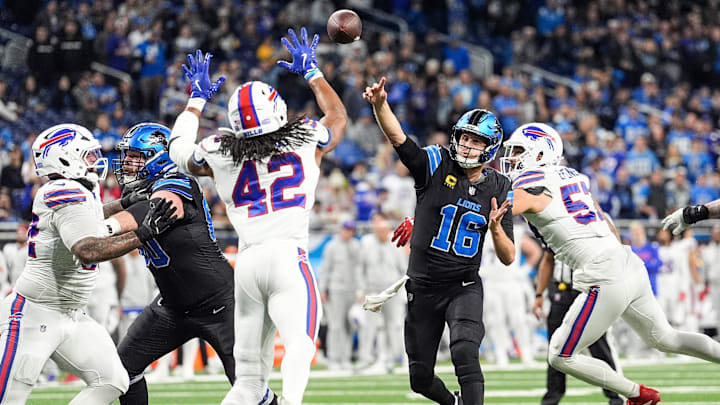 Detroit Lions quarterback Jared Goff (16) makes a pass against Buffalo Bills linebacker Dorian Williams (42) during the second half at Ford Field in Detroit on Sunday, Dec. 15, 2024.