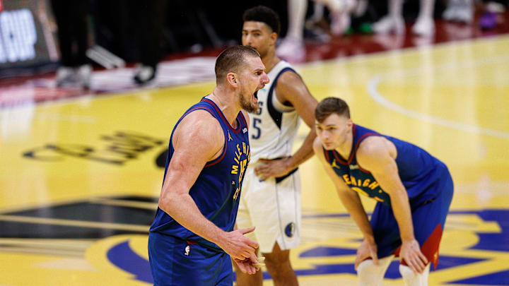 Nov 22, 2024; Denver, Colorado, USA; Denver Nuggets center Nikola Jokic (15) reacts after a play in the fourth quarter against the Dallas Mavericks at Ball Arena. Nov 22, 2024; Denver, Colorado, USA; Denver Nuggets center Nikola Jokic (15) reacts after a play in the fourth quarter against the Dallas Mavericks at Ball Arena.