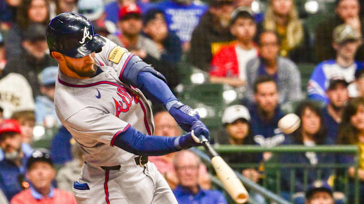 Jun 9, 2025; Milwaukee, Wisconsin, USA;  Atlanta Braves right fielder Eli White (36) hits a 2-run home run in the eighth inning against the Milwaukee Brewers at American Family Field. Mandatory Credit: Benny Sieu-Imagn Images
