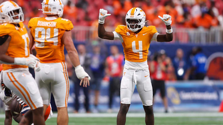 Aug 30, 2025; Atlanta, Georgia, USA; Tennessee Volunteers defensive back Ty Redmond (4) reacts after a stop against the Syracuse Orange in the second quarter at Mercedes-Benz Stadium. Mandatory Credit: Brett Davis-Imagn Images
Aug 30, 2025; Atlanta, Georgia, USA; Tennessee Volunteers defensive back Ty Redmond (4) reacts after a stop against the Syracuse Orange in the second quarter at Mercedes-Benz Stadium. Mandatory Credit: Brett Davis-Imagn Images
