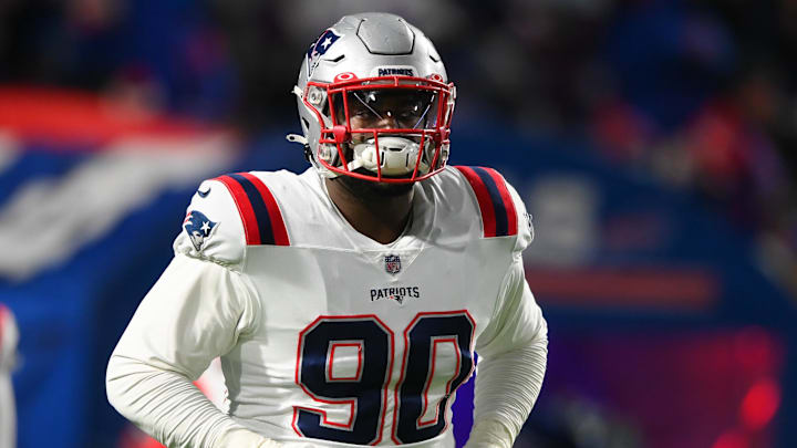 Jan 15, 2022; Orchard Park, New York, USA; New England Patriots defensive end Christian Barmore (90) jogs on the field prior to an AFC Wild Card playoff football game against the Buffalo Bills at Highmark Stadium. Mandatory Credit: Rich Barnes-Imagn Images