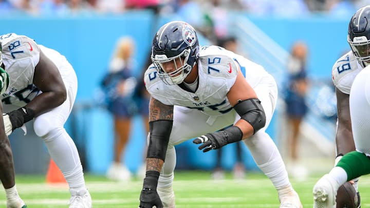 Sep 15, 2024; Nashville, Tennessee, USA; Tennessee Titans offensive tackle Dillon Radunz (75) in his stance against the New York Jets during the first half at Nissan Stadium. Mandatory Credit: Steve Roberts-Imagn Images Sep 15, 2024; Nashville, Tennessee, USA; Tennessee Titans offensive tackle Dillon Radunz (75) in his stance against the New York Jets during the first half at Nissan Stadium. Mandatory Credit: Steve Roberts-Imagn Images
