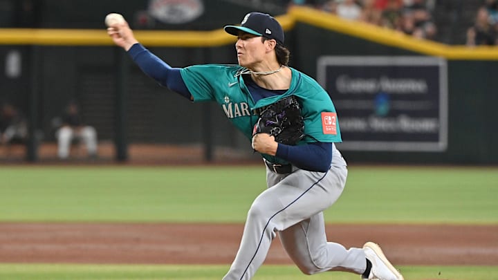 Seattle Mariners pitcher Bryan Woo (22) throws in the first inning against the Arizona Diamondbacks at Chase Field on June 11. Seattle Mariners pitcher Bryan Woo (22) throws in the first inning against the Arizona Diamondbacks at Chase Field on June 11.