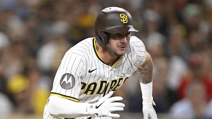 Sep 9, 2025; San Diego, California, USA; San Diego Padres center fielder Jackson Merrill (3) hits an RBI triple during the fifth inning against the Cincinnati Reds at Petco Park. Mandatory Credit: Denis Poroy-Imagn Images Sep 9, 2025; San Diego, California, USA; San Diego Padres center fielder Jackson Merrill (3) hits an RBI triple during the fifth inning against the Cincinnati Reds at Petco Park. Mandatory Credit: Denis Poroy-Imagn Images
