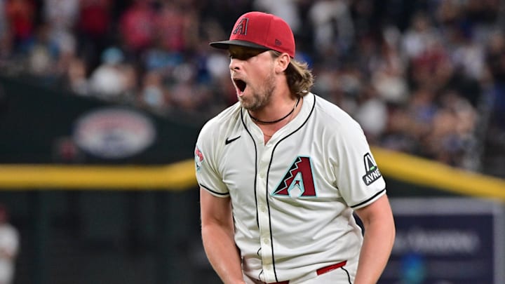 Sep 25, 2024; Phoenix, Arizona, USA; Arizona Diamondbacks pitcher Kevin Ginkel (37) celebrates after beating the San Francisco Giants at Chase Field. Mandatory Credit: Matt Kartozian-Imagn Images