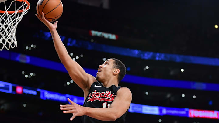 Jan 21, 2024; Los Angeles, California, USA; Portland Trail Blazers guard Malcolm Brogdon (11) moves to the basket against the Los Angeles Lakers during the first half at Crypto.com Arena. Mandatory Credit: Gary A. Vasquez-Imagn Images Jan 21, 2024; Los Angeles, California, USA; Portland Trail Blazers guard Malcolm Brogdon (11) moves to the basket against the Los Angeles Lakers during the first half at Crypto.com Arena. Mandatory Credit: Gary A. Vasquez-Imagn Images