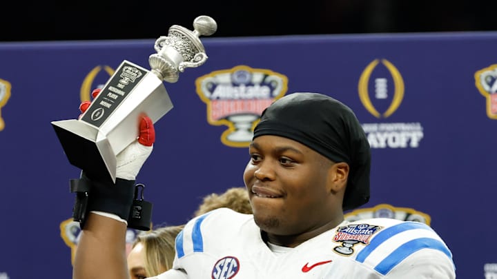 Rebels defensive tackle Will Echoles, along with his teammates, gave a salute to Corey Adams after winning the Sugar Bowl. 
