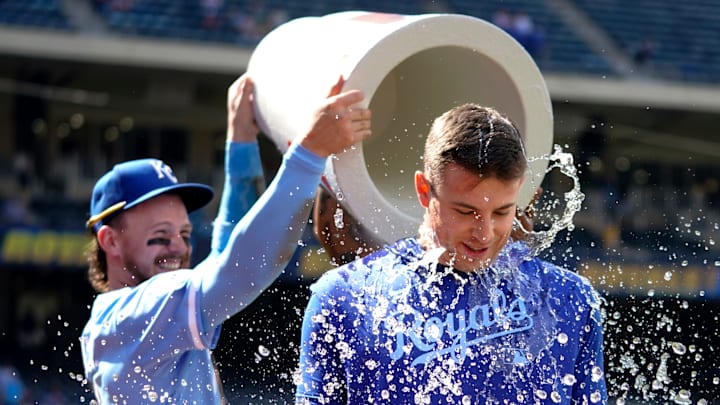 Royals starting pitcher Kris Bubic gets splashed by Bobby Witt Jr during a game vs the White Sox.