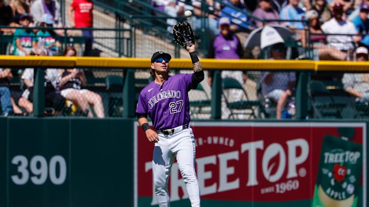 Apr 5, 2026; Denver, Colorado, USA; Colorado Rockies left fielder Jordan Beck (27) makes a catch in the third inning against the Philadelphia Phillies at Coors Field. Mandatory Credit: Isaiah J. Downing-Imagn Images Apr 5, 2026; Denver, Colorado, USA; Colorado Rockies left fielder Jordan Beck (27) makes a catch in the third inning against the Philadelphia Phillies at Coors Field. Mandatory Credit: Isaiah J. Downing-Imagn Images