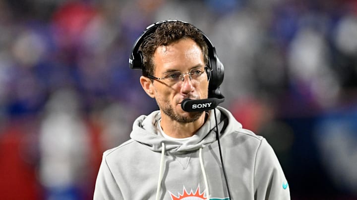 Sep 18, 2025; Orchard Park, New York, USA;  Miami Dolphins head coach Mike McDaniel looks on in the first quarter against the Buffalo Bills at Highmark Stadium. Mandatory Credit: Mark Konezny-Imagn Images