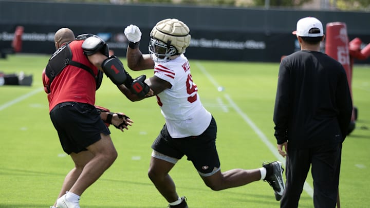 Jul 23, 2025; Santa Clara, CA, USA; San Francisco 49ers defensive end Mykel Williams (98) works on a blocking drill during the first day of training camp at SAP Performance Facility. Mandatory Credit: D. Ross Cameron-Imagn Images Jul 23, 2025; Santa Clara, CA, USA; San Francisco 49ers defensive end Mykel Williams (98) works on a blocking drill during the first day of training camp at SAP Performance Facility. Mandatory Credit: D. Ross Cameron-Imagn Images