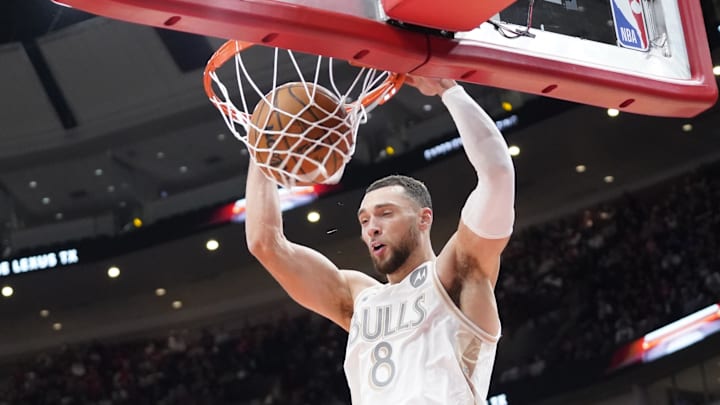 Jan 25, 2025; Chicago, Illinois, USA; Chicago Bulls guard Zach LaVine (8) dunks the ball against the Philadelphia 76ers during the first quarter at United Center. Mandatory Credit: David Banks-Imagn Images