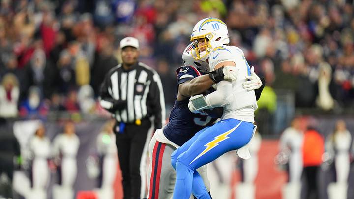 Jan 11, 2026; Foxborough, MA, USA; New England Patriots defensive end Milton Williams (97) sacks Los Angeles Chargers quarterback Justin Herbert (10) during the fourth quarter in an AFC Wild Card Round game at Gillette Stadium. Mandatory Credit: David Butler II-Imagn Images Jan 11, 2026; Foxborough, MA, USA; New England Patriots defensive end Milton Williams (97) sacks Los Angeles Chargers quarterback Justin Herbert (10) during the fourth quarter in an AFC Wild Card Round game at Gillette Stadium. Mandatory Credit: David Butler II-Imagn Images