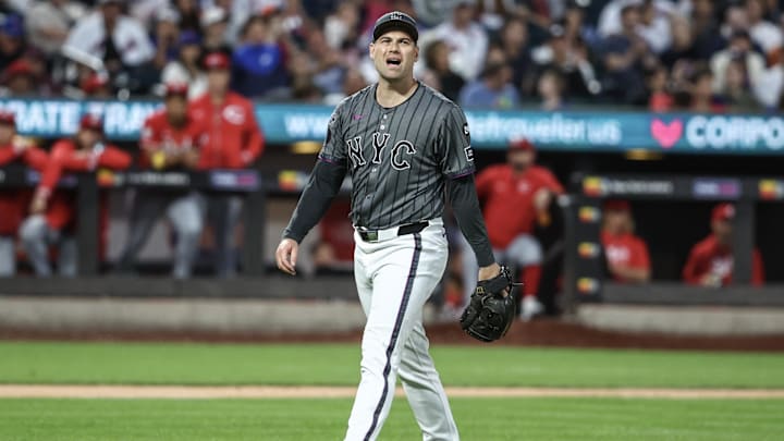 Sep 7, 2024; New York City, New York, USA;  New York Mets relief pitcher Adam Ottavino (0) reacts after retiring the side in the seventh inning against the Cincinnati Reds at Citi Field. 