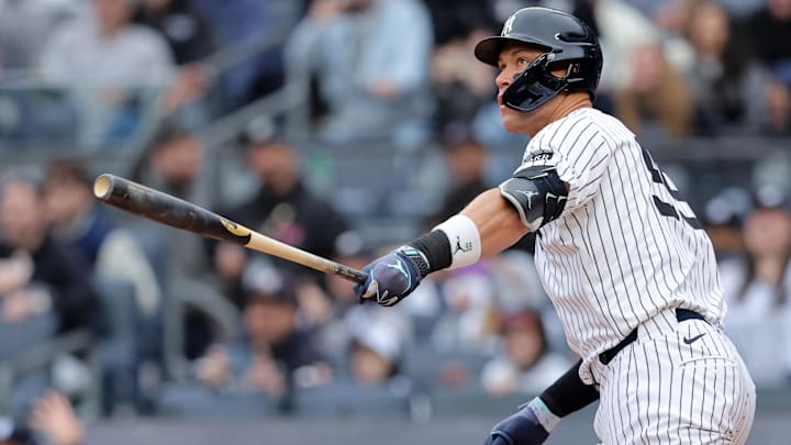 Mar 30, 2025; Bronx, New York, USA; New York Yankees right fielder Aaron Judge (99) watches his two run home run against the Milwaukee Brewers during the first inning at Yankee Stadium. Mandatory Credit: Brad Penner-Imagn Images