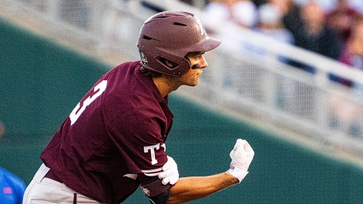 Jun 19, 2024; Omaha, NE, USA; Texas A&M Aggies second baseman Kaeden Kent (3) celebrates after hitting a double against the Florida Gators during the fifth inning at Charles Schwab Field Omaha. Mandatory Credit: Dylan Widger-USA TODAY Sports