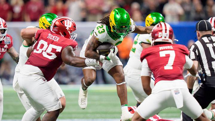 Oregon running back Dierre Hill Jr. carries the ball as the Oregon Ducks face the Indiana Hoosiers in the Peach Bowl on Jan. 9, 2026, at Mercedes-Benz Stadium in Atlanta, Georgia. Oregon running back Dierre Hill Jr. carries the ball as the Oregon Ducks face the Indiana Hoosiers in the Peach Bowl on Jan. 9, 2026, at Mercedes-Benz Stadium in Atlanta, Georgia.